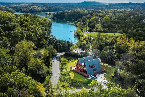 Our Double A-Frame lakefront retreat in the Smoky Mountains. Pet-friendly with hot tub, pickleball court