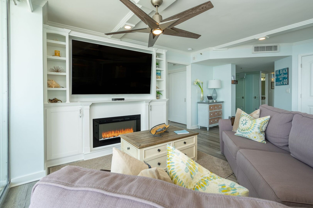 Amazing views from Living room area with fireplace, large TV and balcony access
