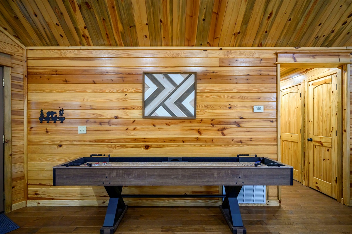 🏒 Game night ready. Full-size shuffleboard for hours of indoor fun.