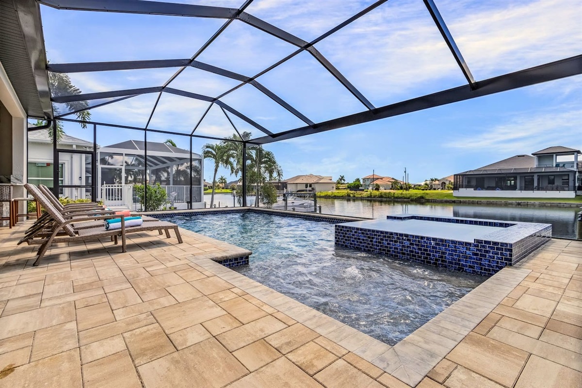 Make a splash in the stunning custom pool and spa, where relaxation meets luxury in your private oasis!