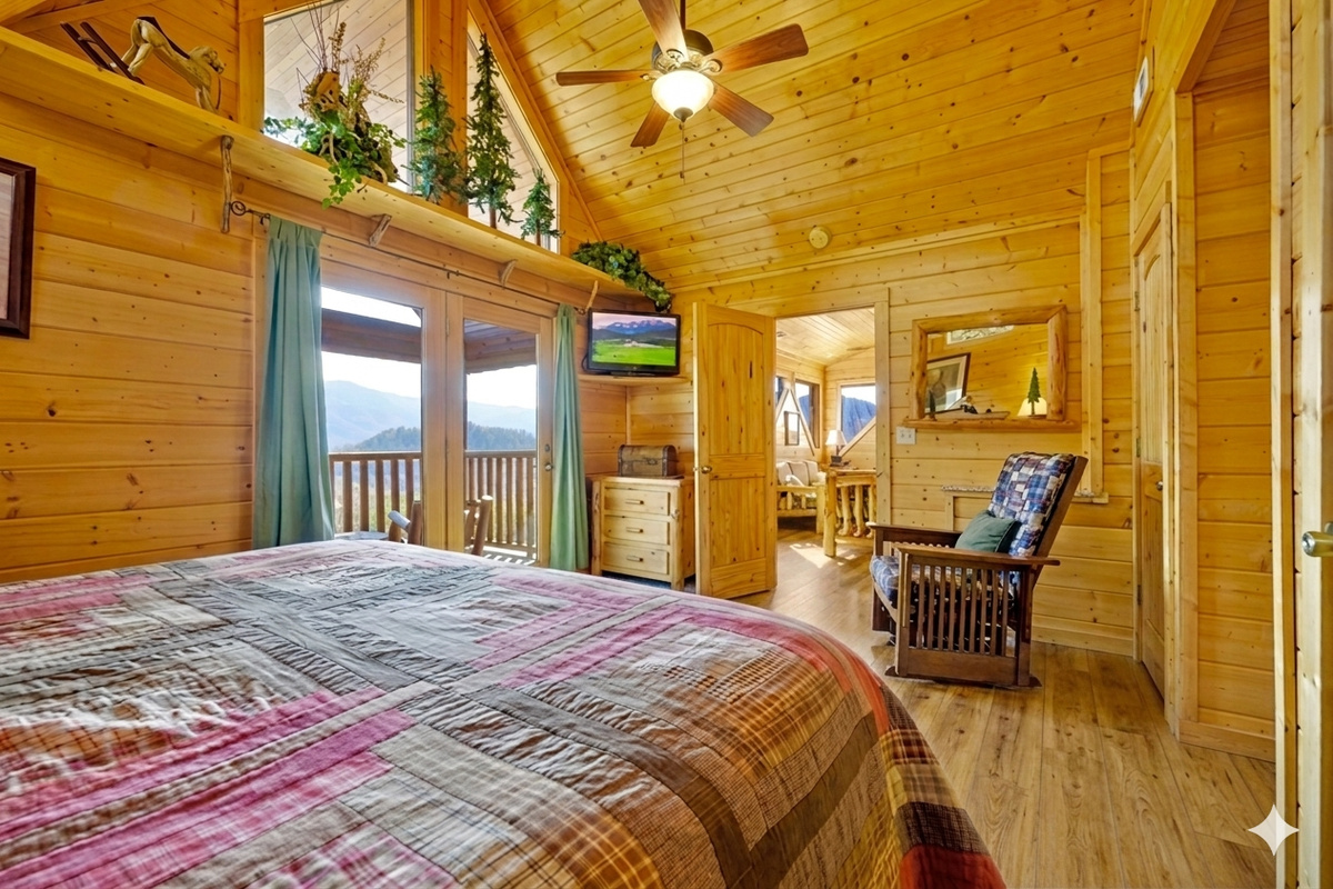Bedroom #2 - This bright, airy suite opens up to stunning views and golden morning light. Unwind in bed, watch the sunrise, or step onto the balcony for a breath of fresh mountain air.