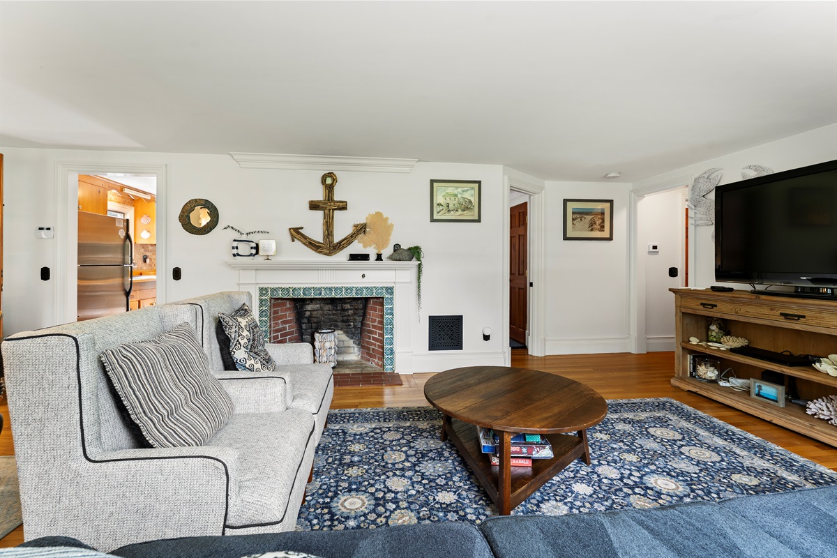 Gather, unwind, and enjoy your favorite shows in the spacious living room.