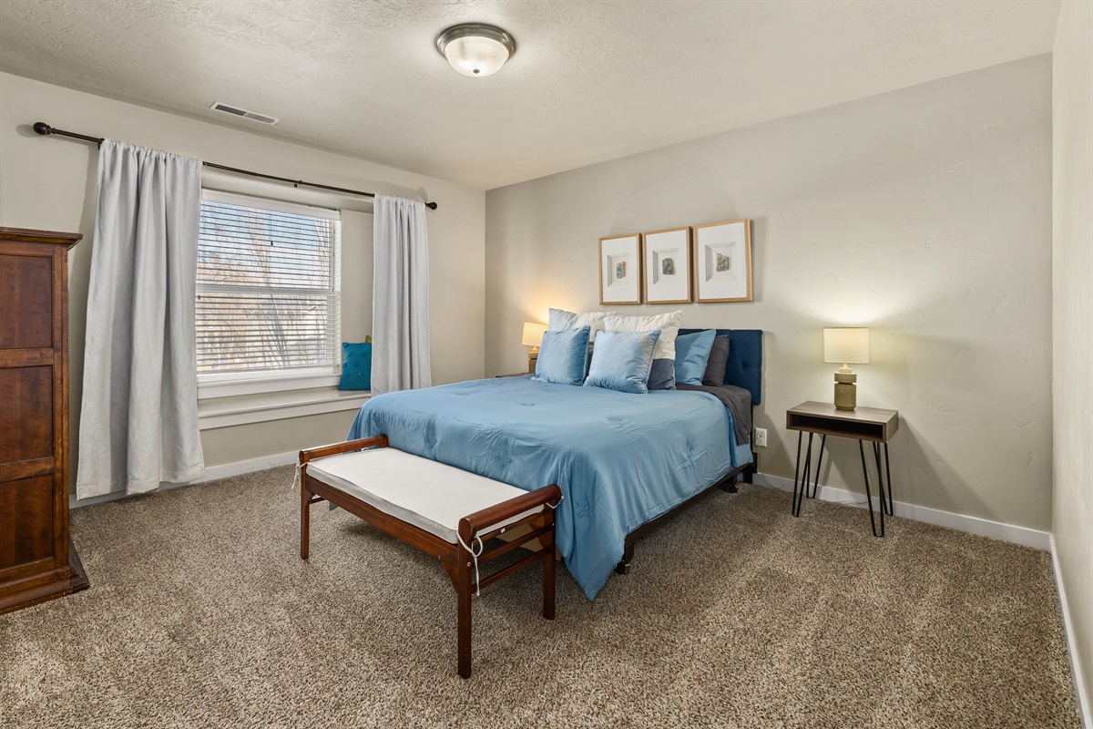 Home #2 Primary Bedroom with comfortable king bed.