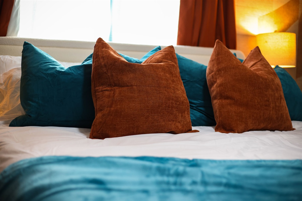 Bedroom 2: Vibrant yet cozy bedroom oasis, perfect for relaxing after San Antonio adventures.