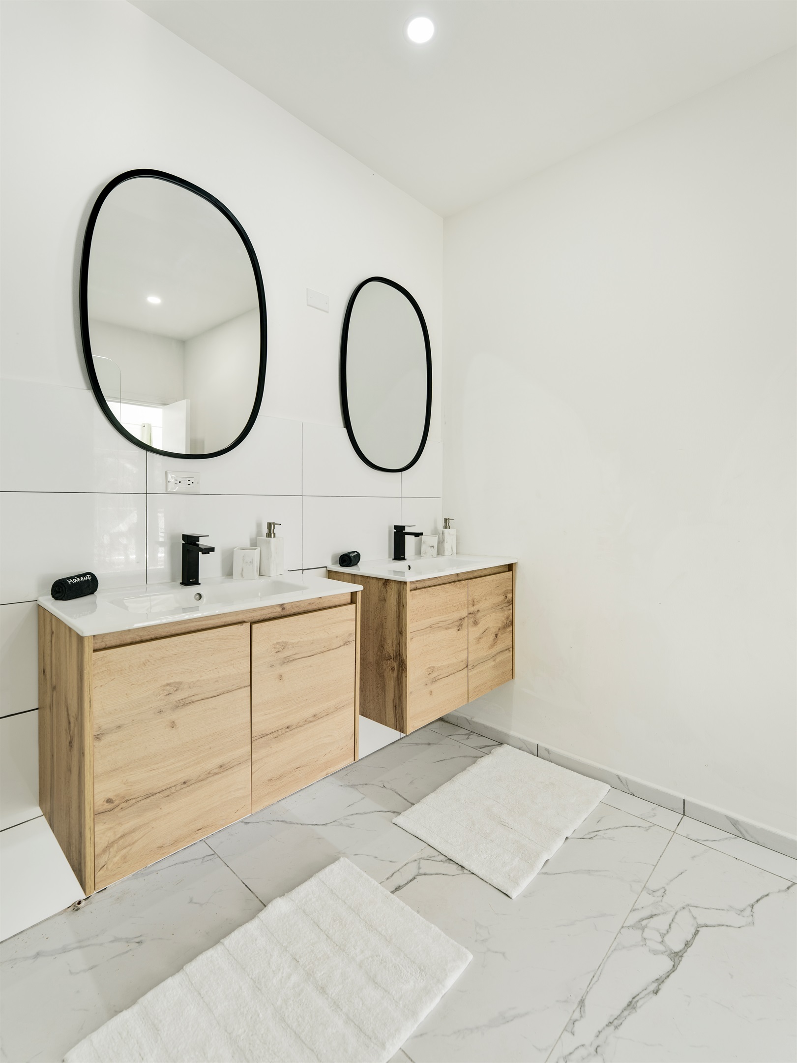 Modern Bathroom with Spacious Double Vanity & Marble Counters