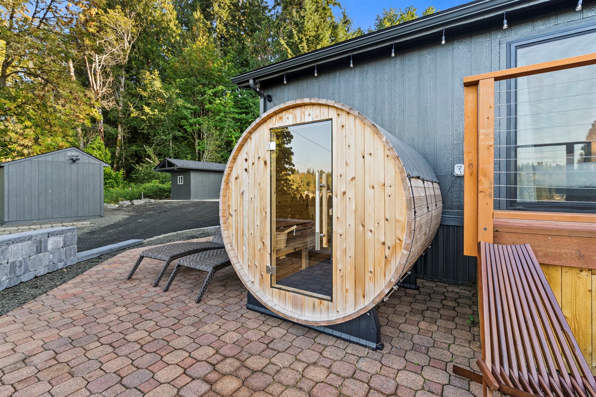 Rejuvenate your senses in the wet/dry barrel sauna—a true spa escape with peaceful waterviews