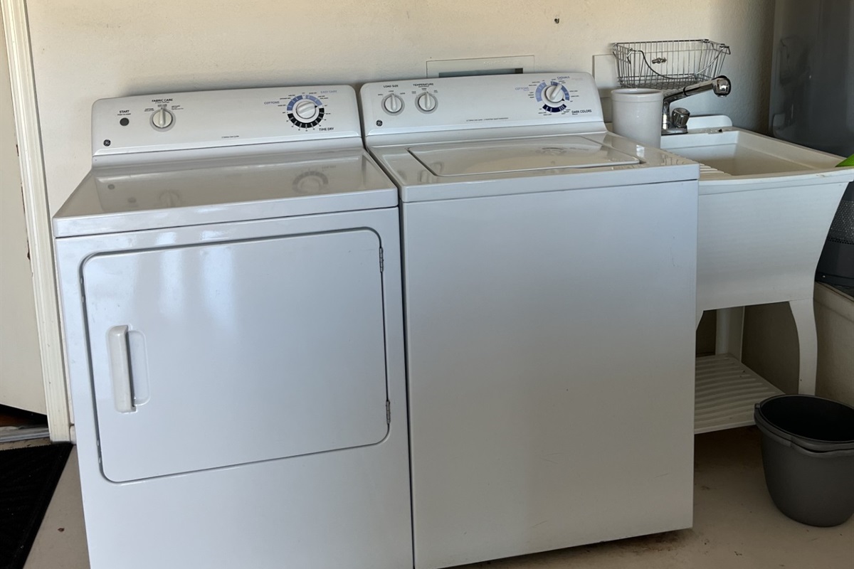 Full size washer and dryer are in the attached garage, off the kitchen