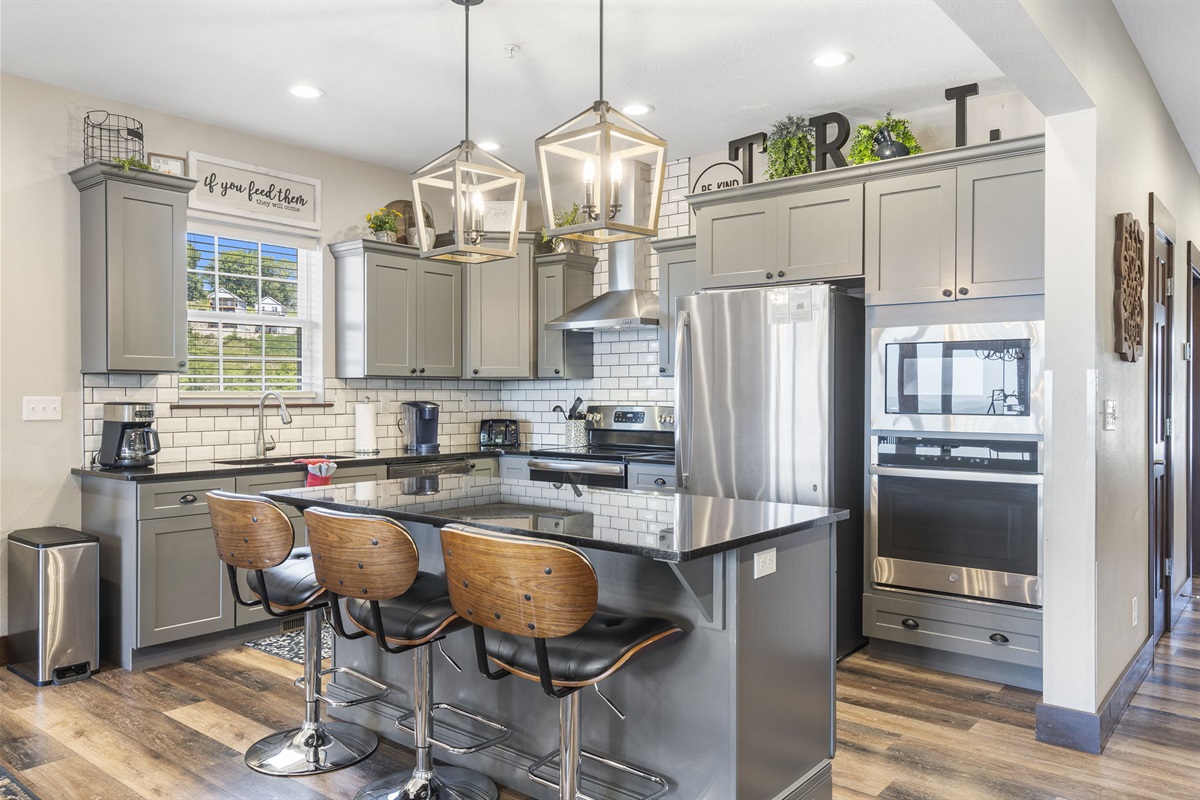 Spacious kitchen with extra seating at the island. Just bring the food!
