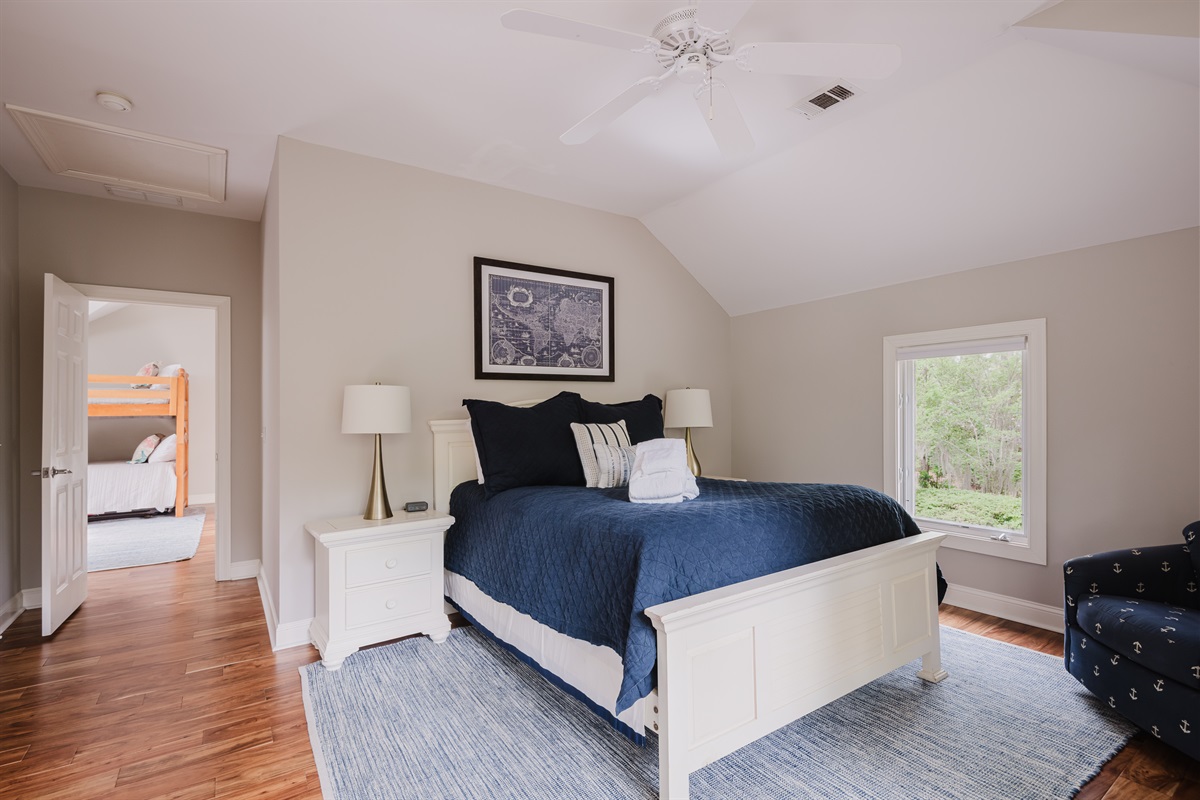 Fourth Bedroom features a queen bed with private bath