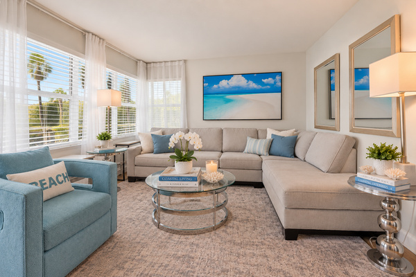 Spacious living area with comfortable seating and a relaxed coastal atmosphere.