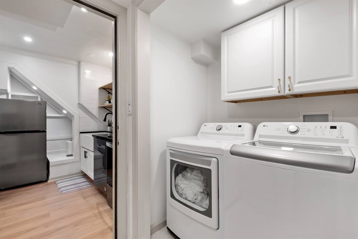 Sizable washer and dryer with complimentary detergent and dryer sheets.