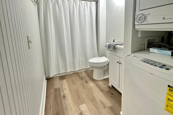 Bathroom with washer and dryer