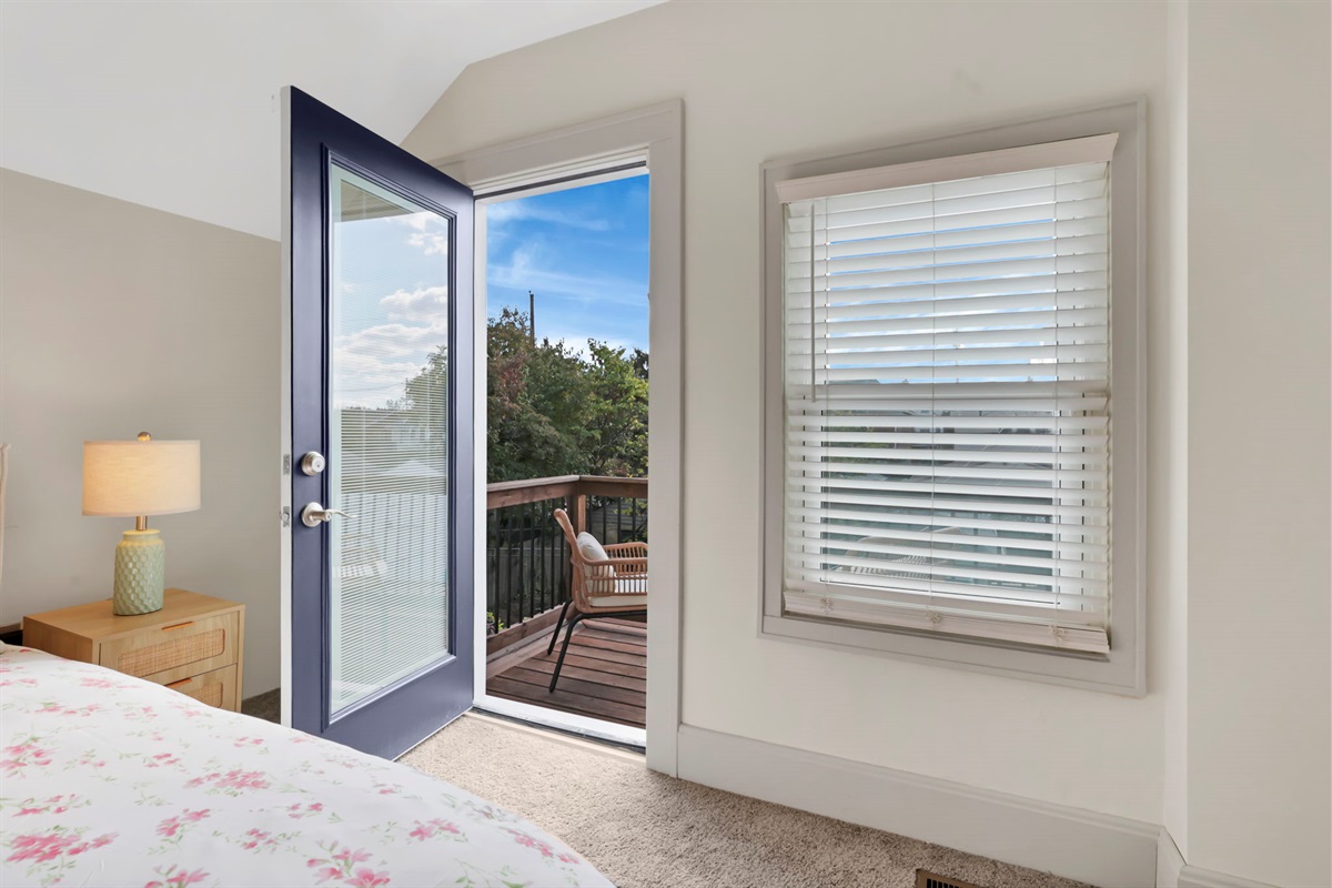 Bedroom 1, queen bed, door to balcony!