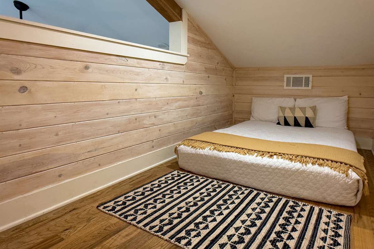 Full bed in the loft of the second bedroom