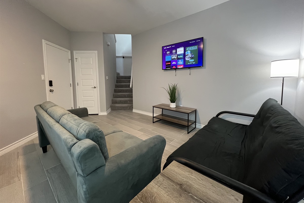 Living Room with Smart TV and Futon