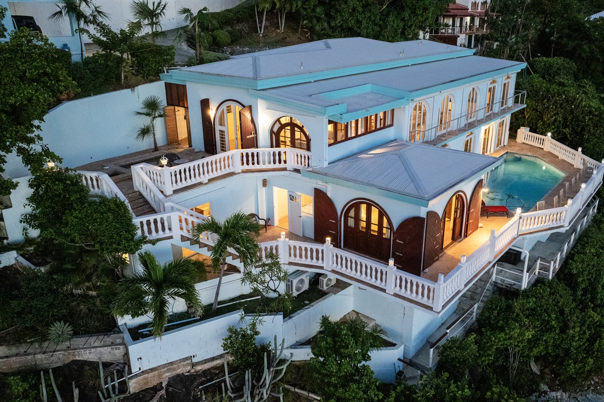 A cliffside escape with unobstructed views of the shimmering sea.