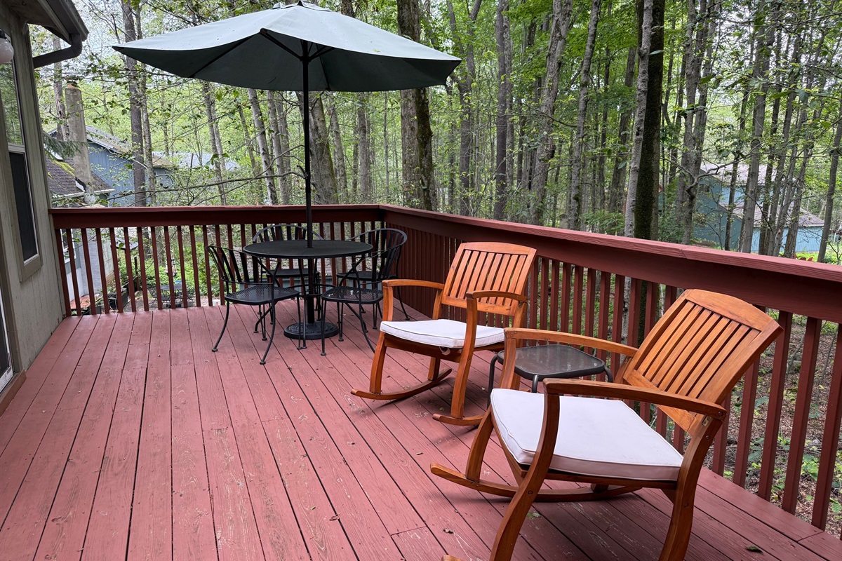 Tables, seating and BBQ on deck