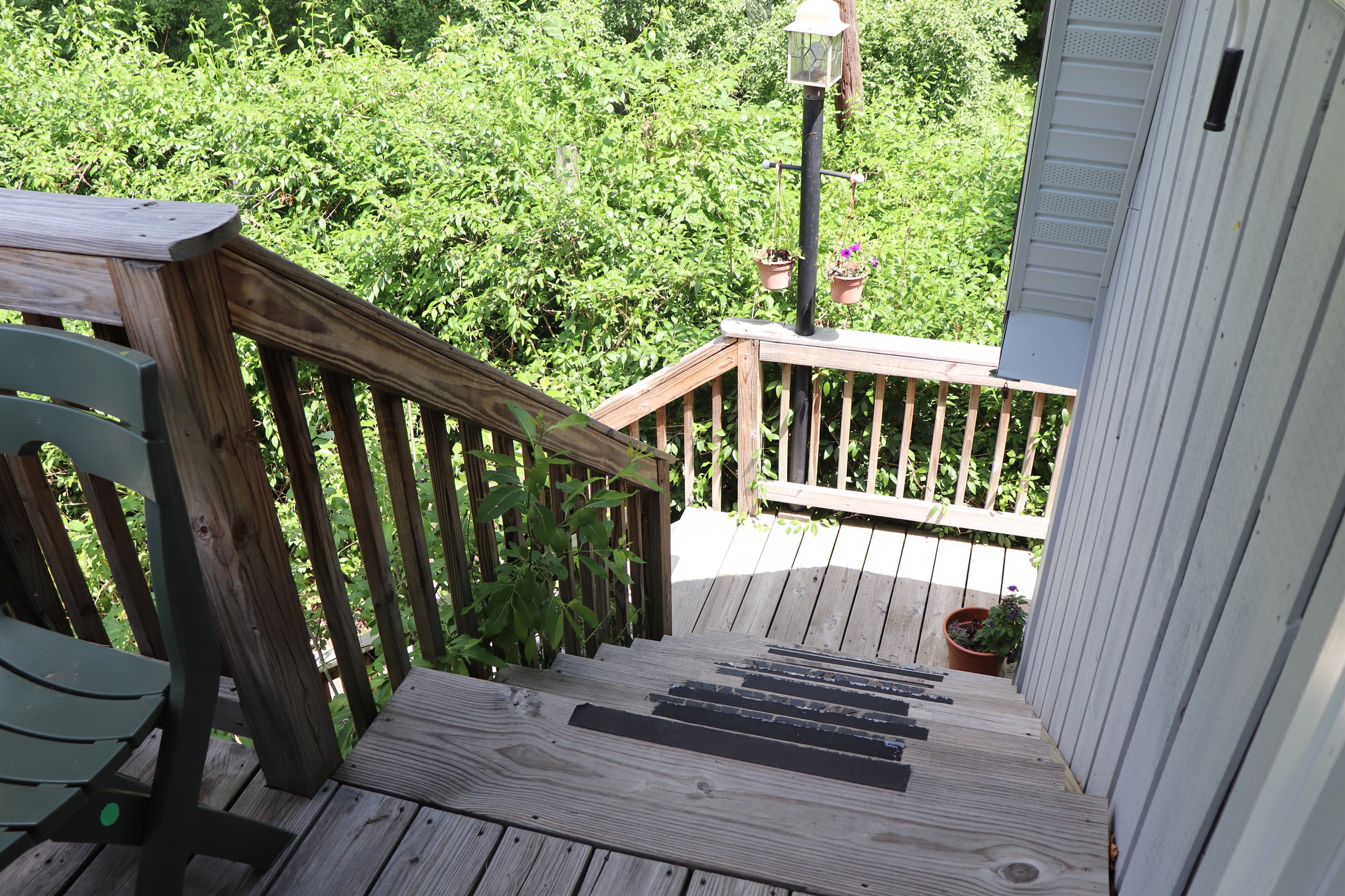 Stairs leading up to the main entrance of Lakeview Cottage.