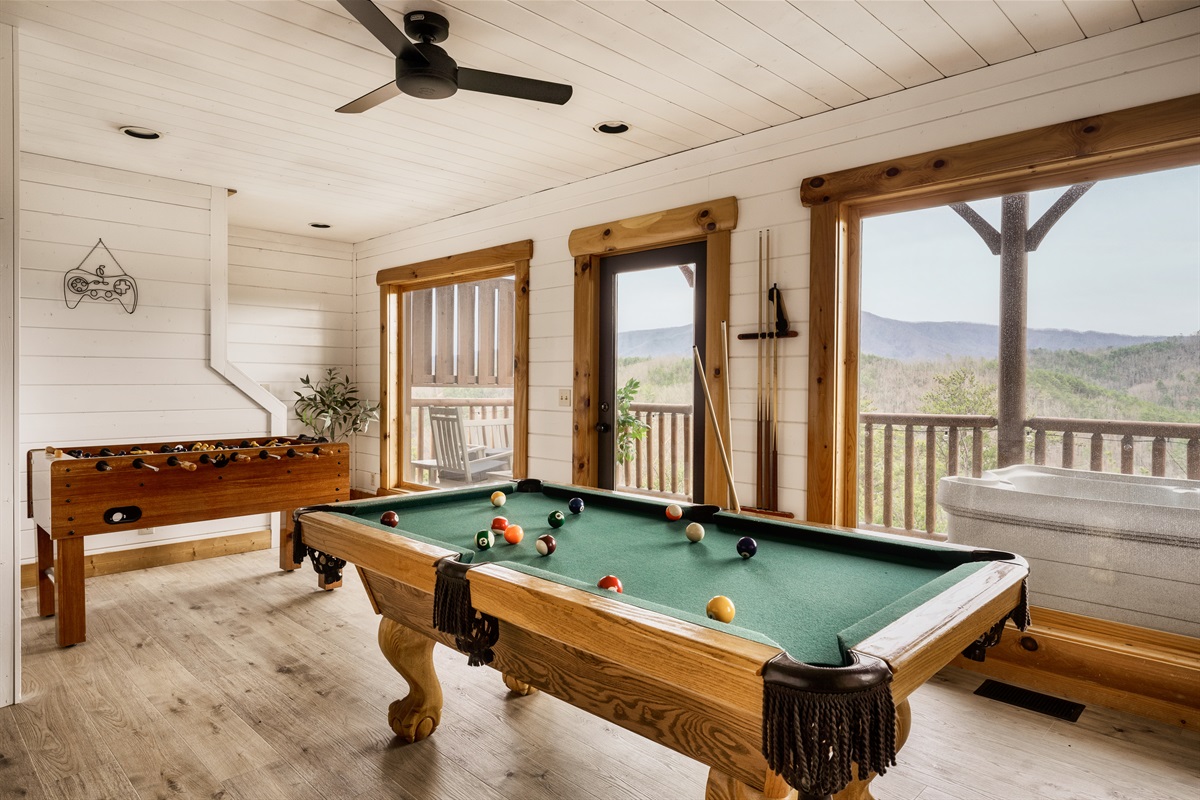 Rack 'em up! Enjoying a game of billiards with a breathtaking mountain backdrop. Nature's beauty adds an extra thrill to every shot!