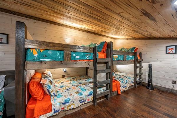 [Bedroom #5] "Woodland Tower" is a bunk loft with 4 queen beds and a queen sleeper sofa