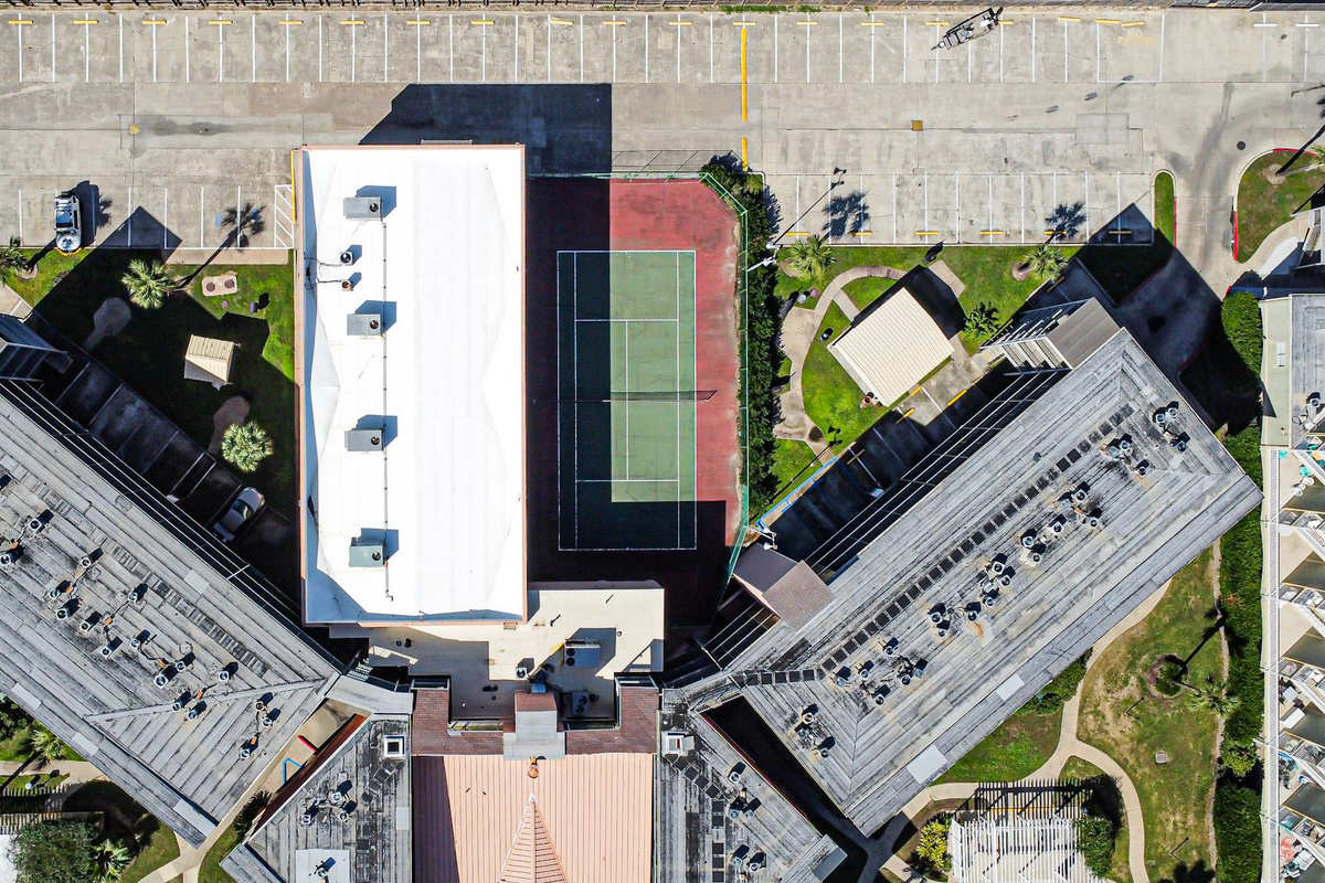 Tennis court (the BBQ area on the left in this picture also has a fish cleaning station)