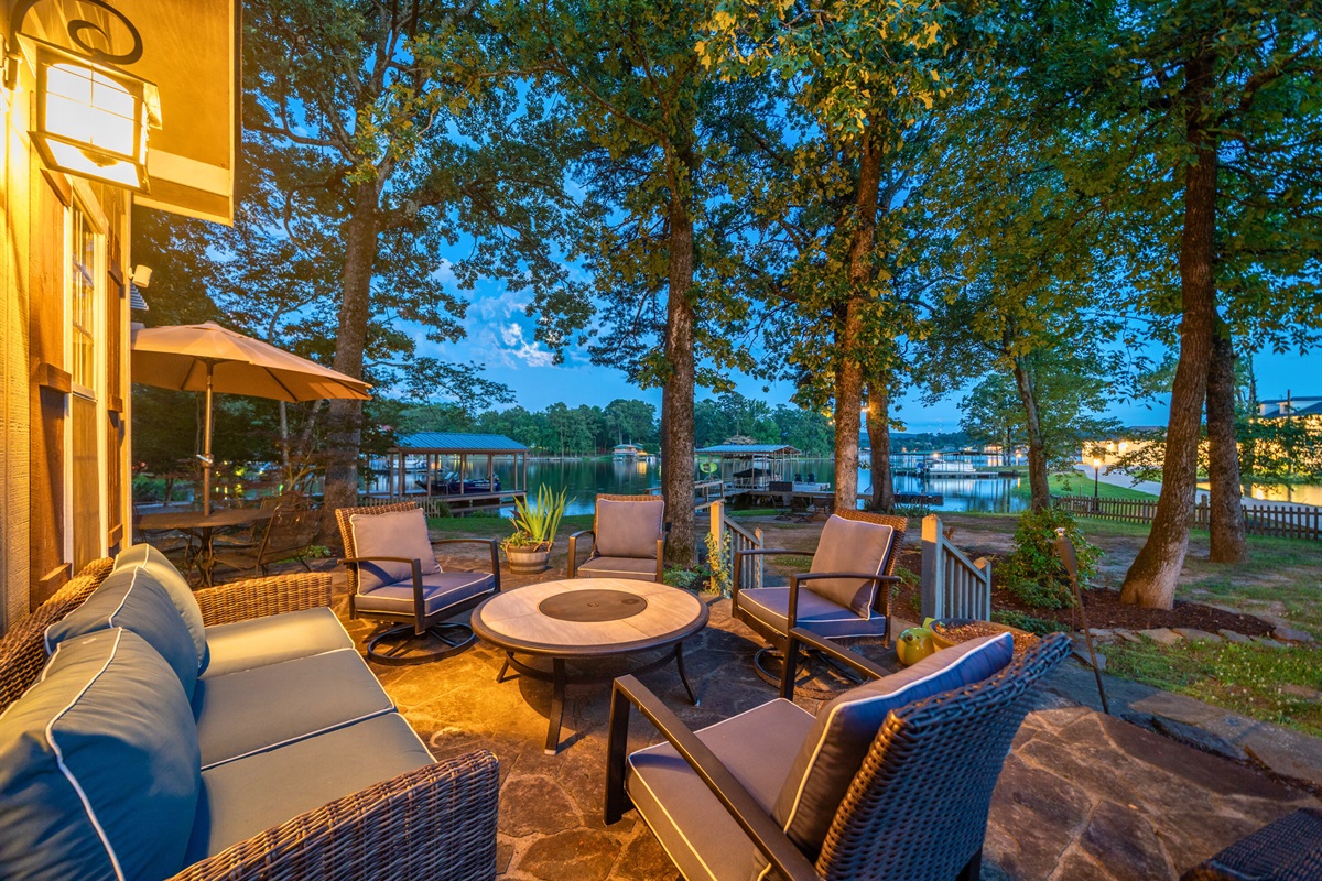 This inviting outdoor lounge space is made for slow mornings, breezy afternoons, and cozy firepit nights.