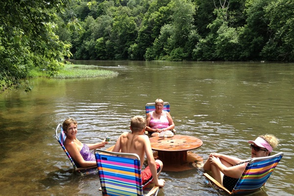 this is river sitting!   we provide beach chairs and a river table ;)