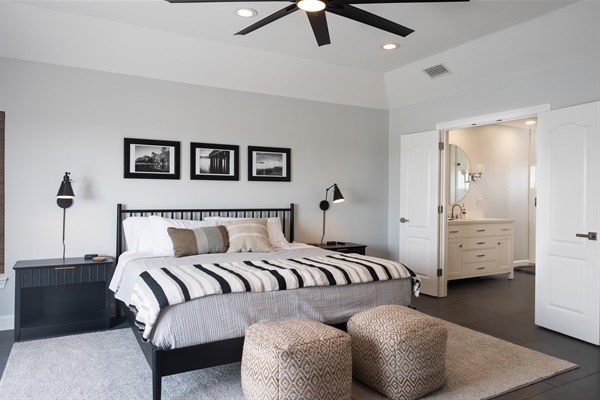 Primary Suite with king bed and private deck with Lagoon and Gulf views