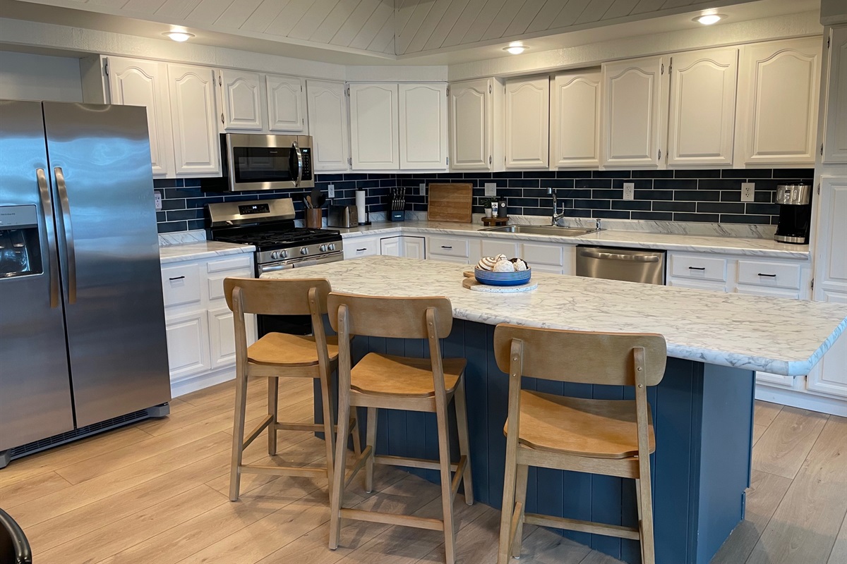 Fully equipped kitchen with large pantry cabinet for food storage