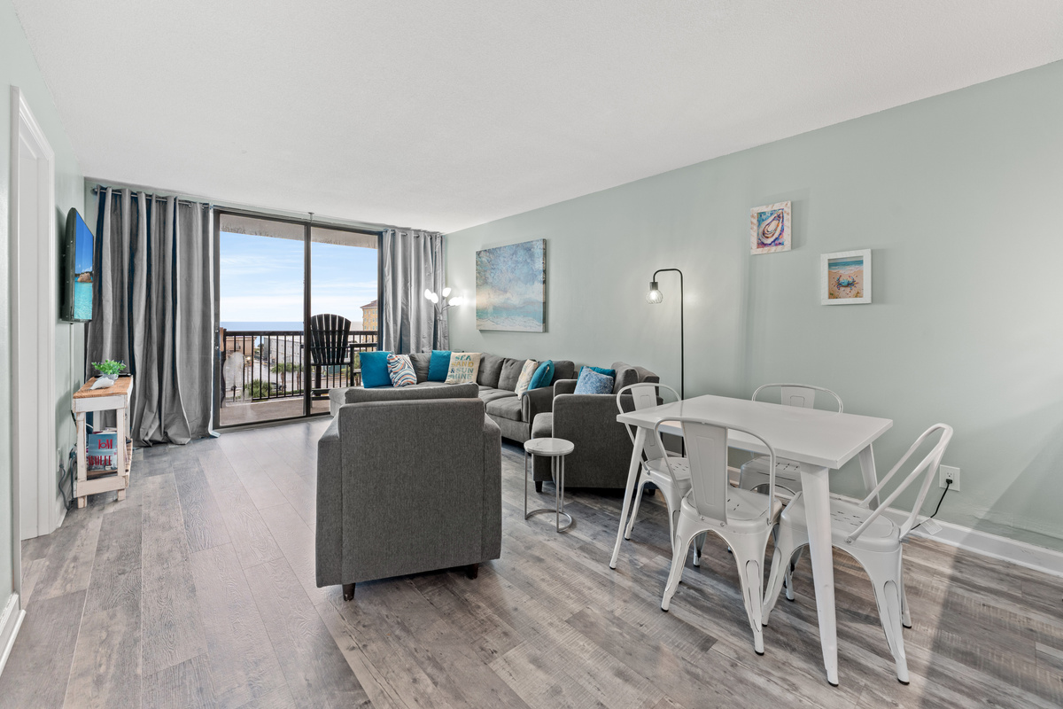Living room and dining area with seating for 4