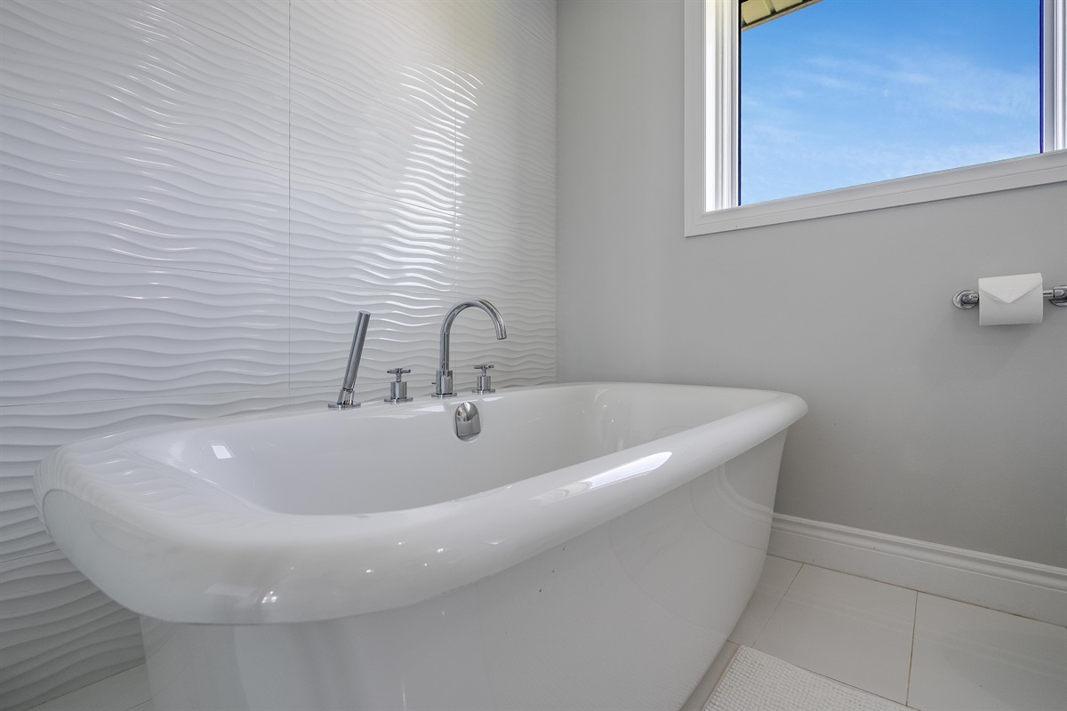 A bathroom where glamour meets calm.