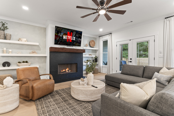 Large open floor plan with stylish and cozy living room.