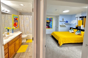Full Bathroom right beside the queen bed at the Kids zone