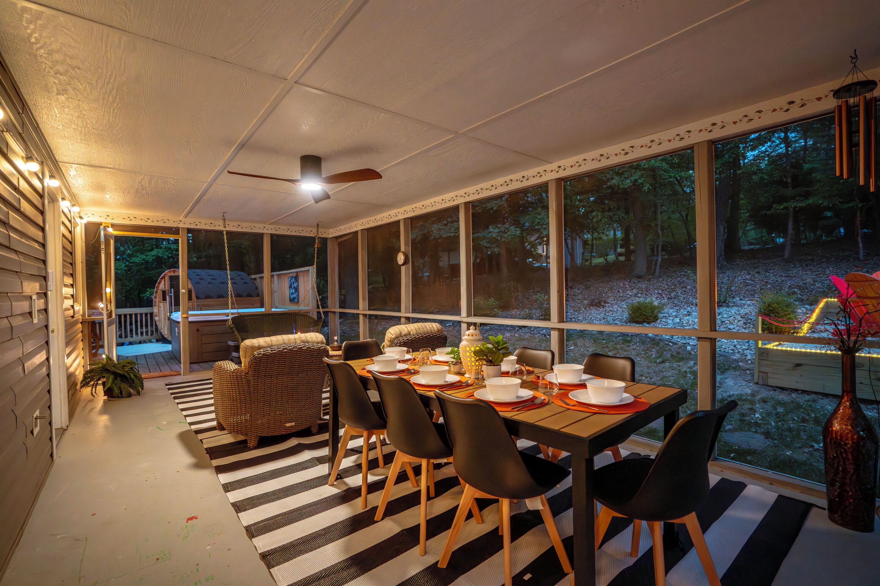 Screened in porch with dining for 8 plus additional comfy seating area
