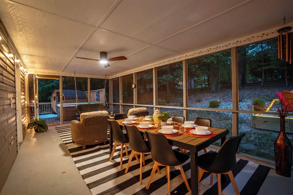 Screened in porch with dining for 8 plus additional comfy seating area
