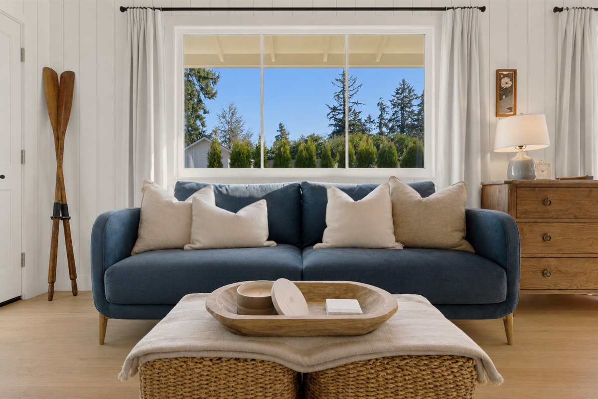 This beautifully designed lounge space invites slow mornings, afternoon naps, and cozy evenings in.