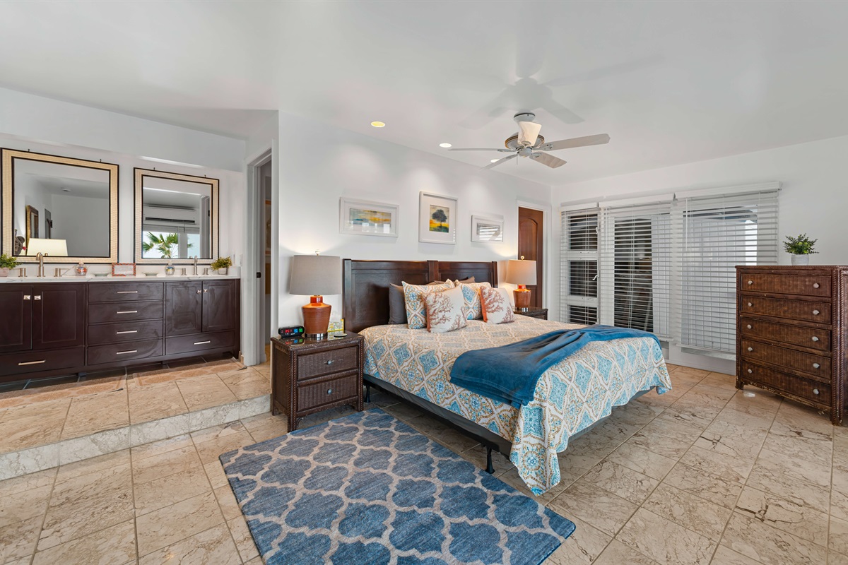 The twin/king (shown was king here) guest room has a large closet, balcony access and an ensuite bathroom