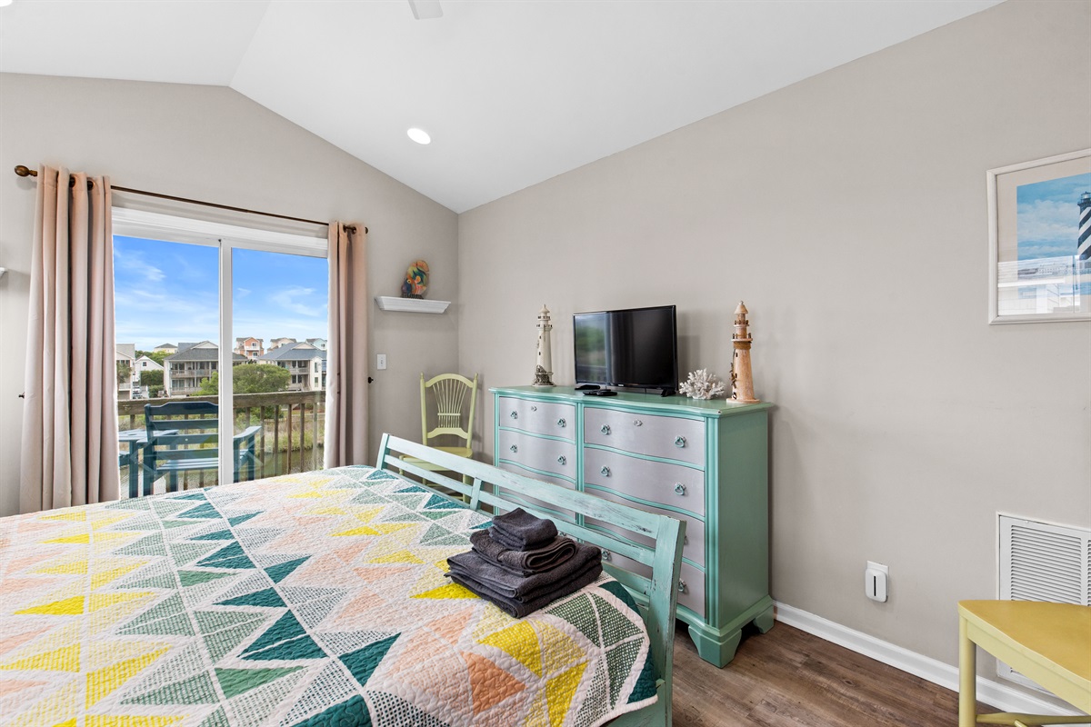 Dresser with TV for in-room entertainment and extra storage