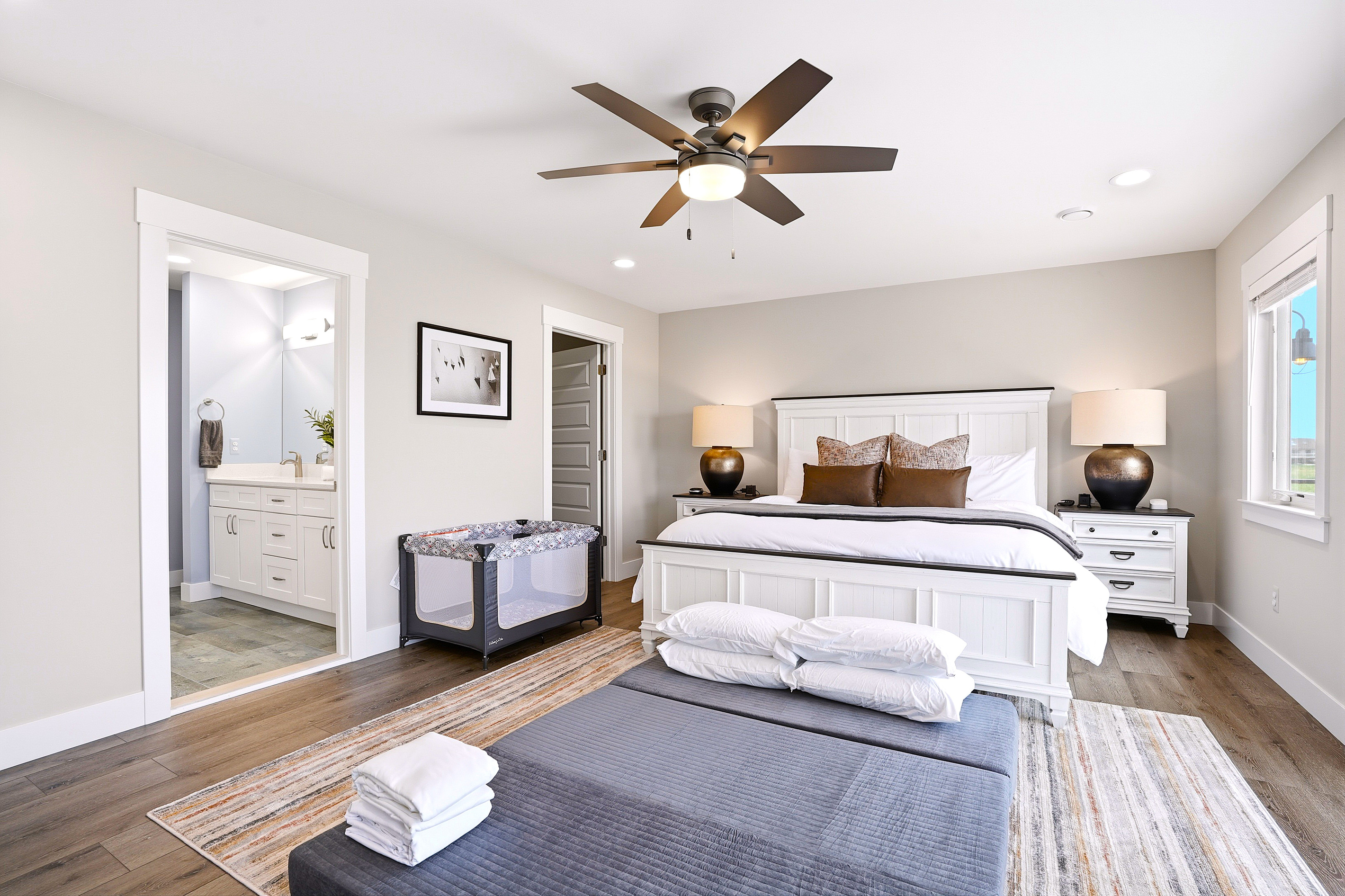 Step into your private oasis, complete with a spacious en-suite bathroom featuring a double vanity, oversized double walk-in shower, and a private water closet for added comfort and privacy.