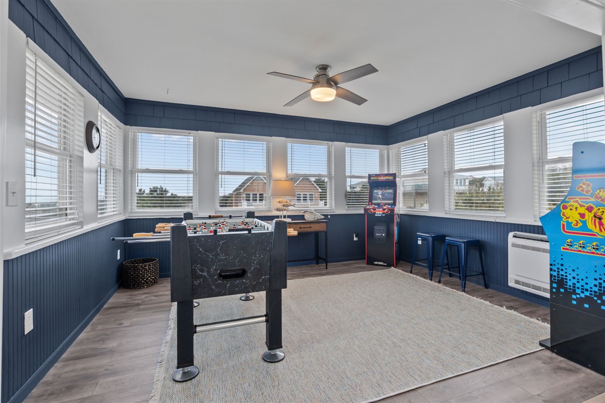 Game room with plenty of windows and space to hang out or unwind.