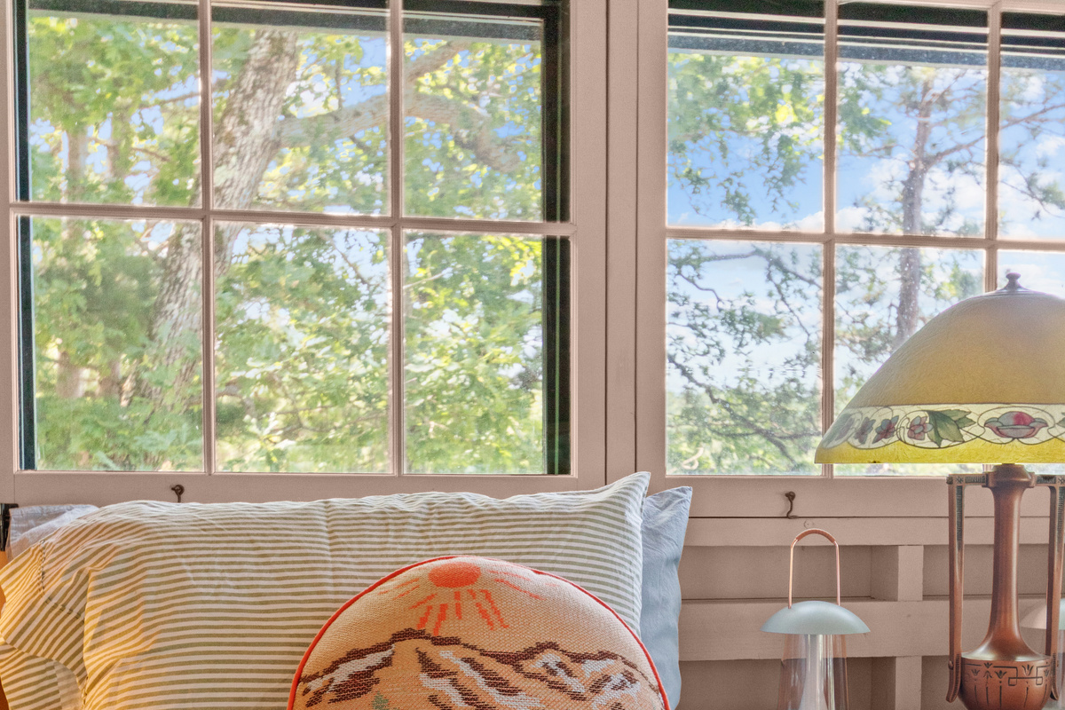 Bright, airy, and surrounded by windows, this space lets you soak in the beauty of the lake all day long.