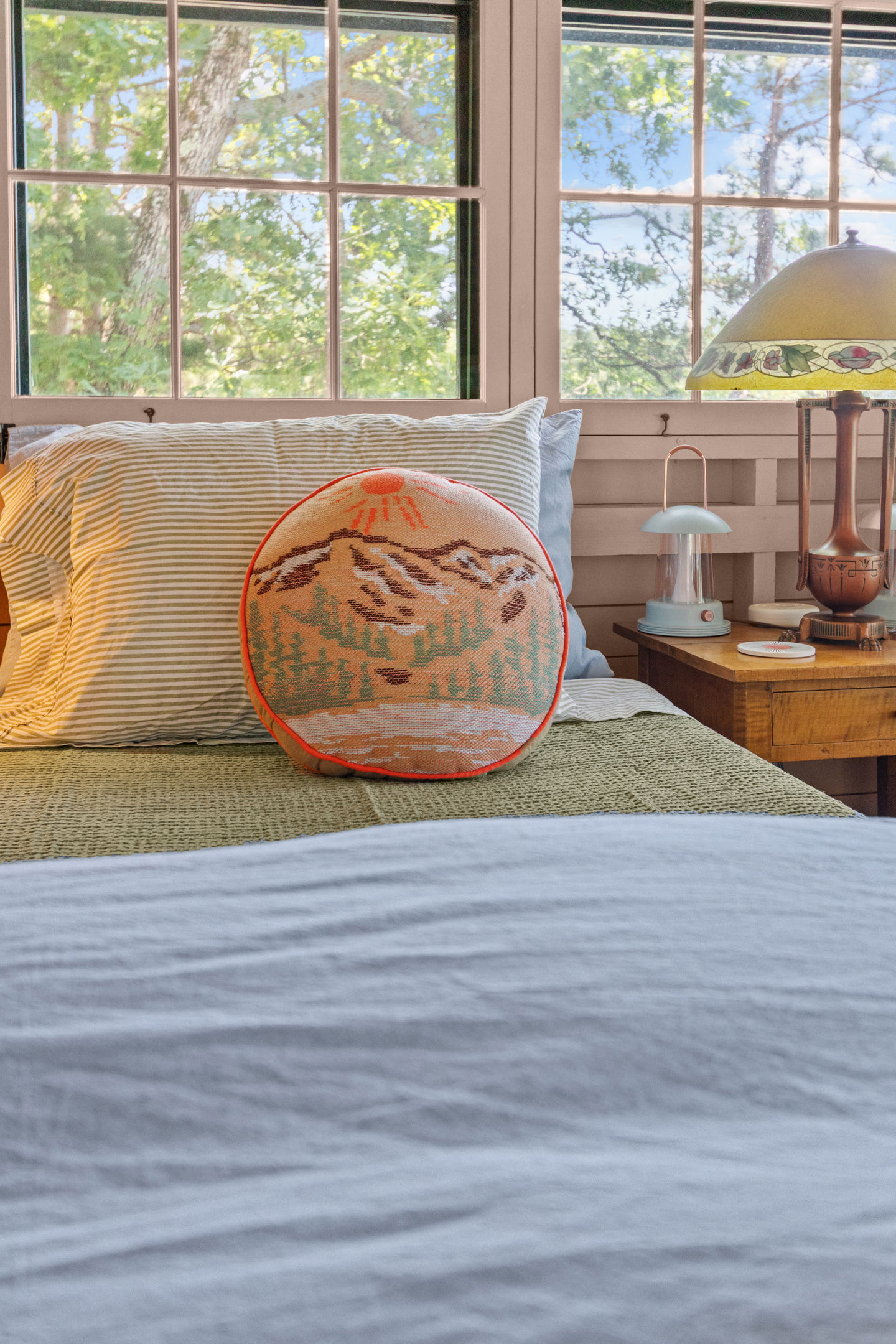 Bright, airy, and surrounded by windows, this space lets you soak in the beauty of the lake all day long.