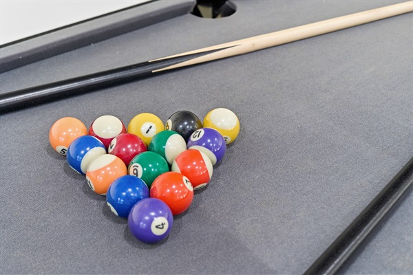 Lower level with Smart TV, PlayStation 5, foosball, mini pool table