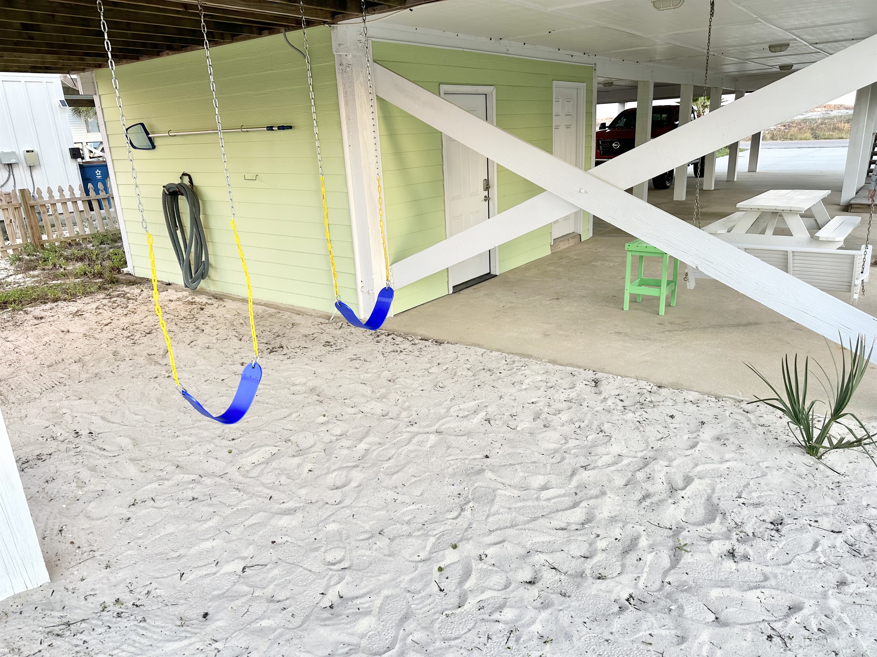 Play area with swings
