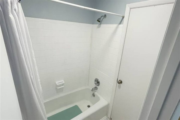 TUB & SHOWERtub & shower combo located between the two 1/2 baths.
