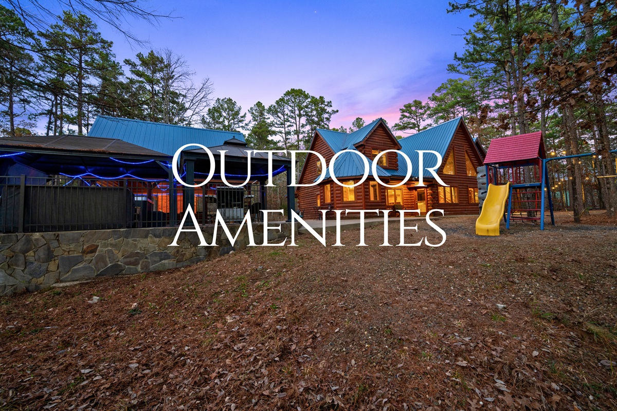 Just outside the cabin, the amenities area offers plenty of room to relax, play, and enjoy the fresh air surrounded by trees.