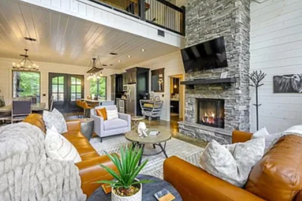 Stylish living room with fireplace and comfortable seating.