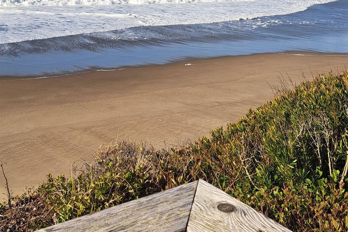 Stroll through the Bella Beach neighborhood, where every path seems to lead straight to the beach.