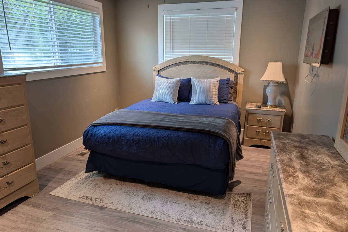 Enjoy this queen bed with a smart tv