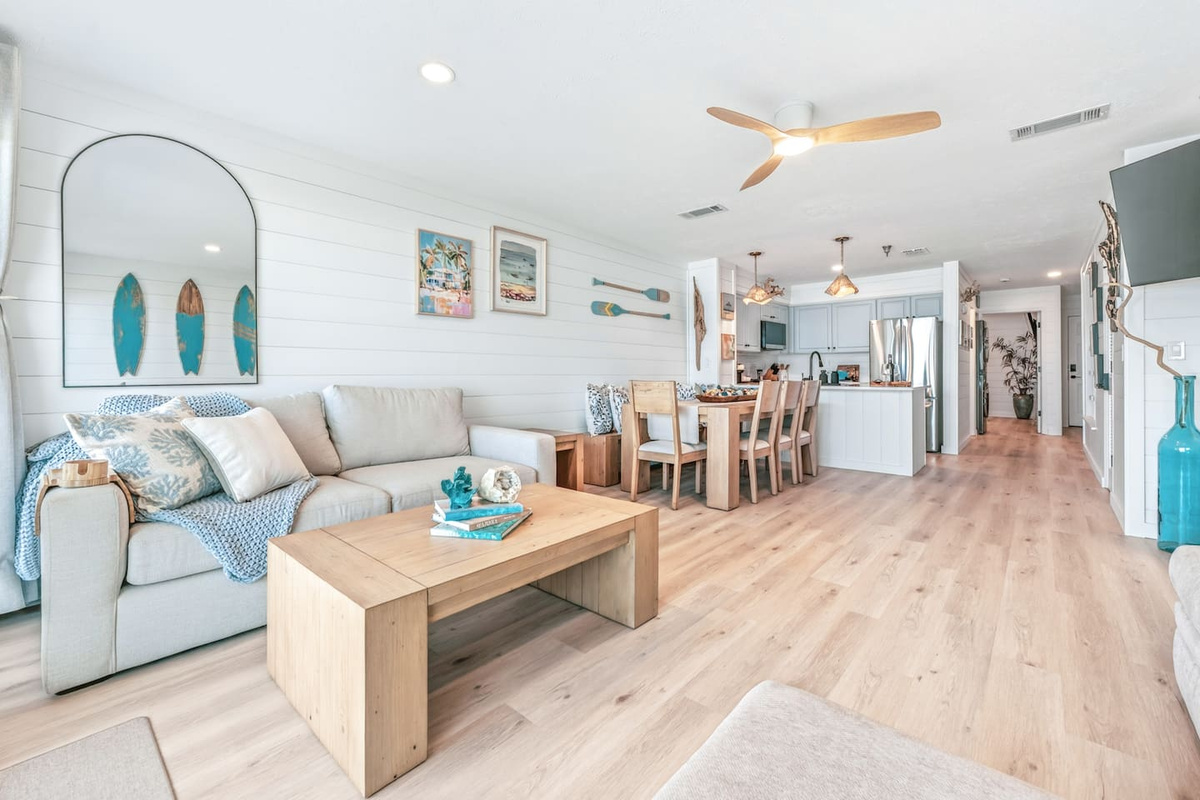 Inviting family-friendly living room with sleeper sofas and ocean views